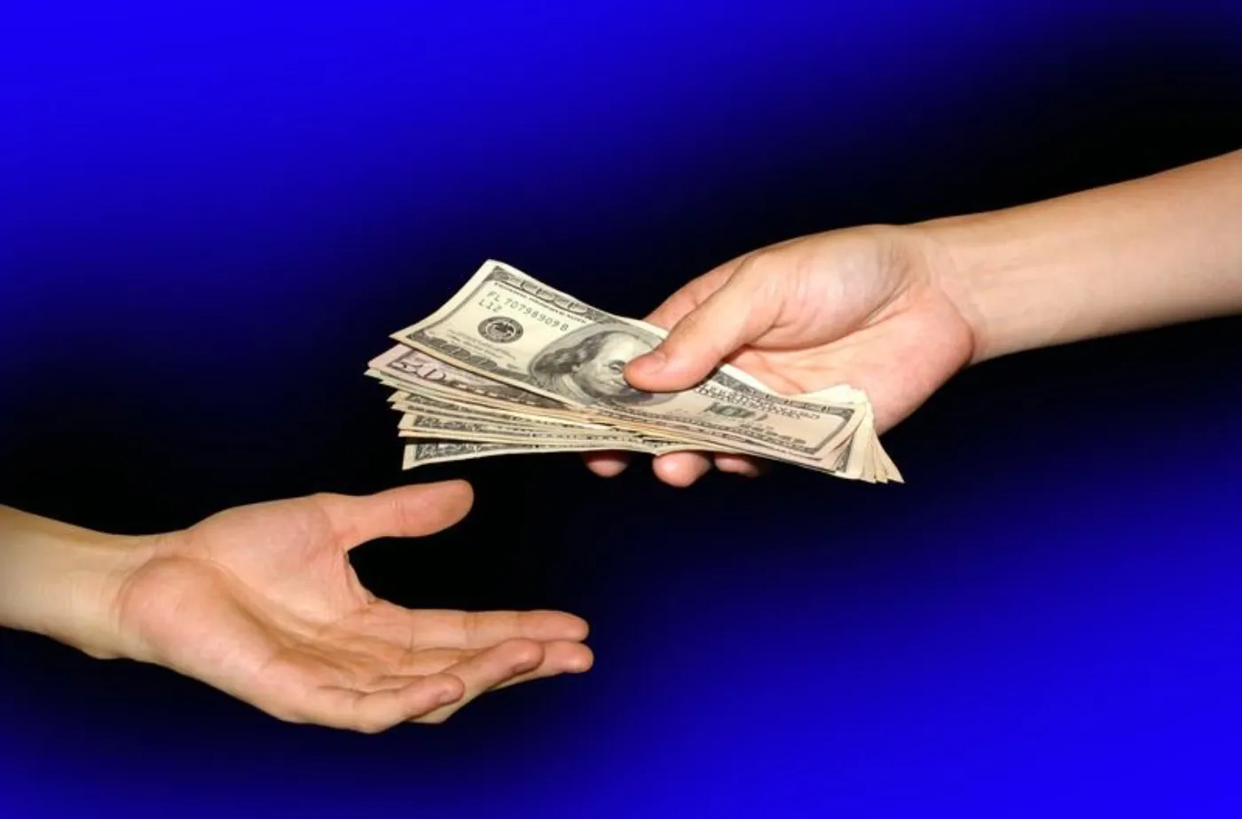 handing money over
