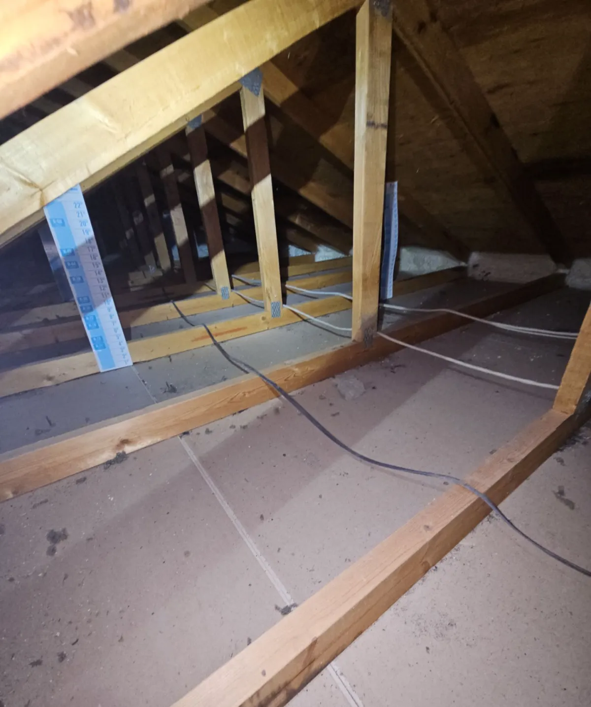 Attic floor vacuumed clean down to the drywall in a Longmont home, ready for air sealing and blown-in insulation