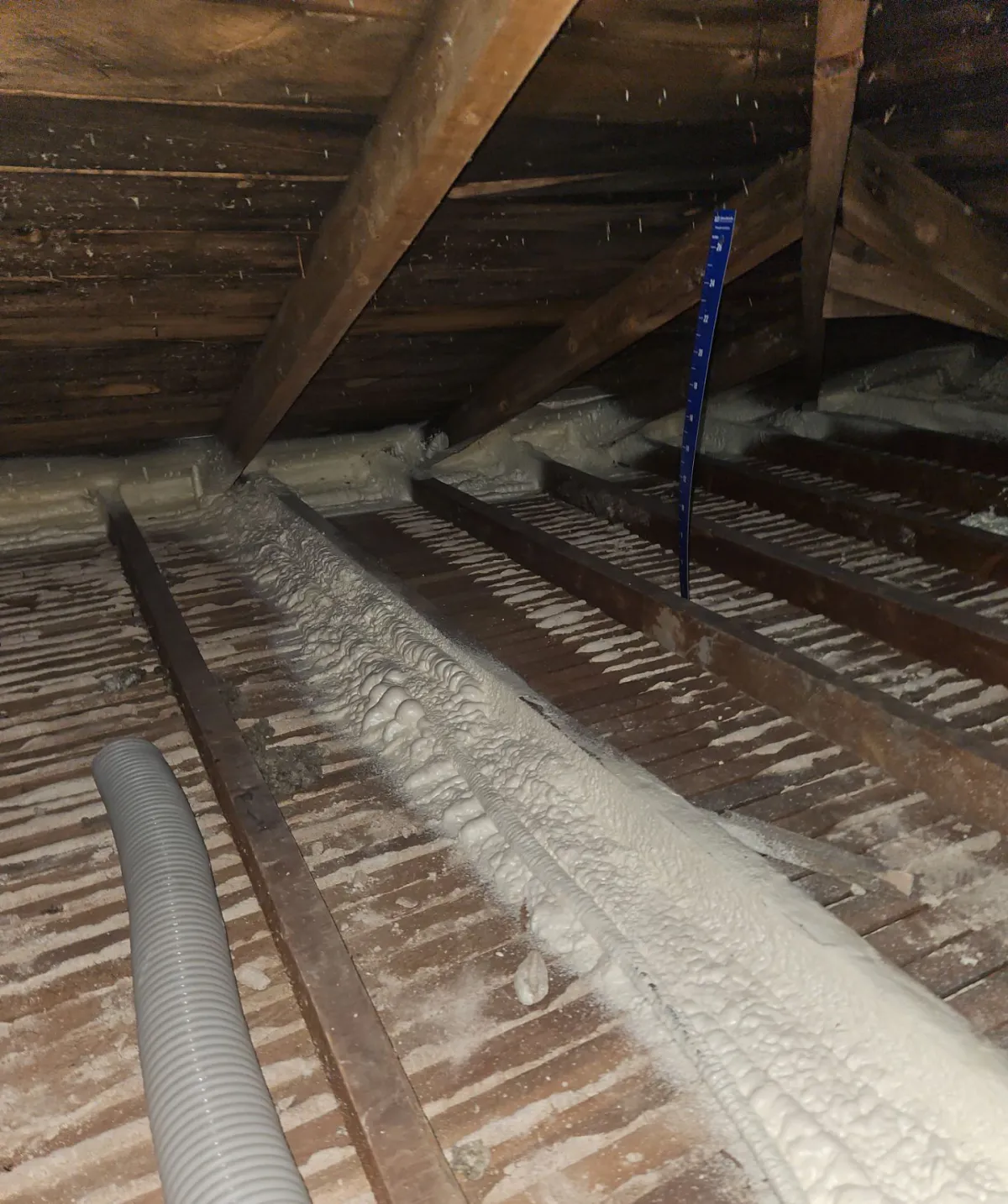 Cheyenne attic with spray foam sealed along every exterior top plate and joist, ready for new insulation